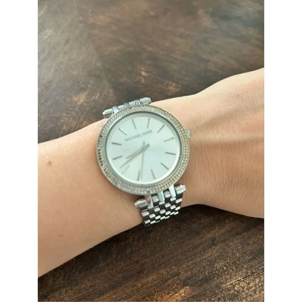 Michael Kors silver color faux diamond watch fits a small wrist 5 inches laying